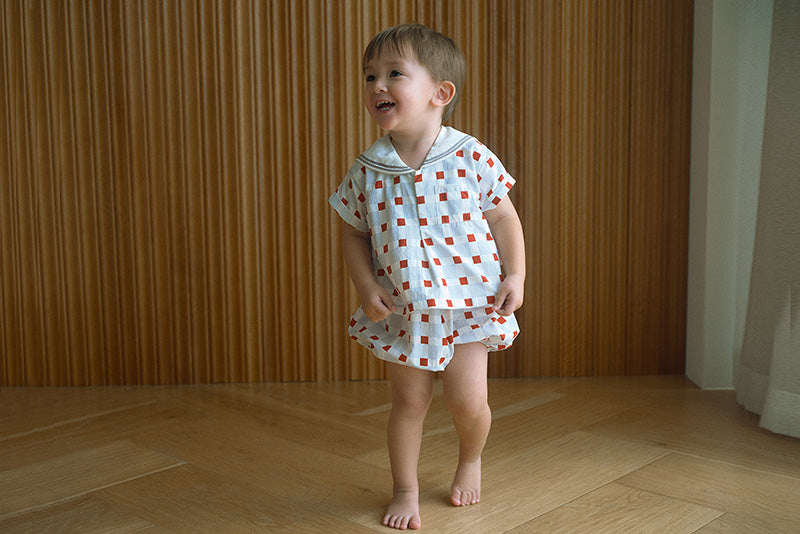 paddle rompers block blue