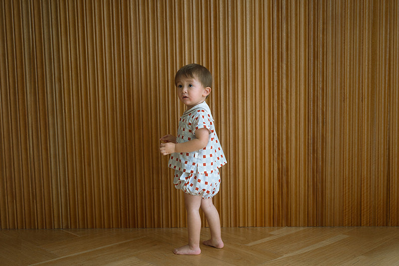 paddle rompers block blue